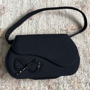 Classic Black Stuart Weitzman clutch w/dust bag.